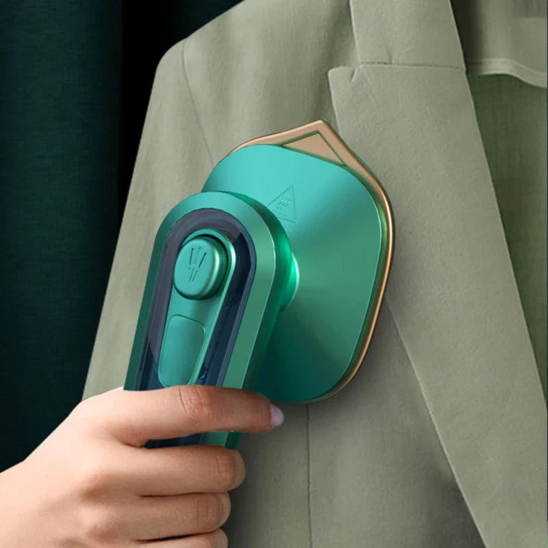 Portable steam ironing machine for clothes